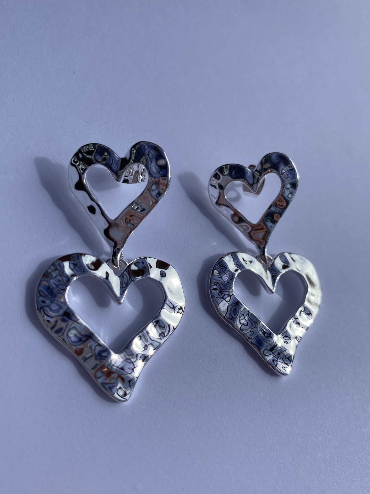 Ada's heart drop earrings in silver plating