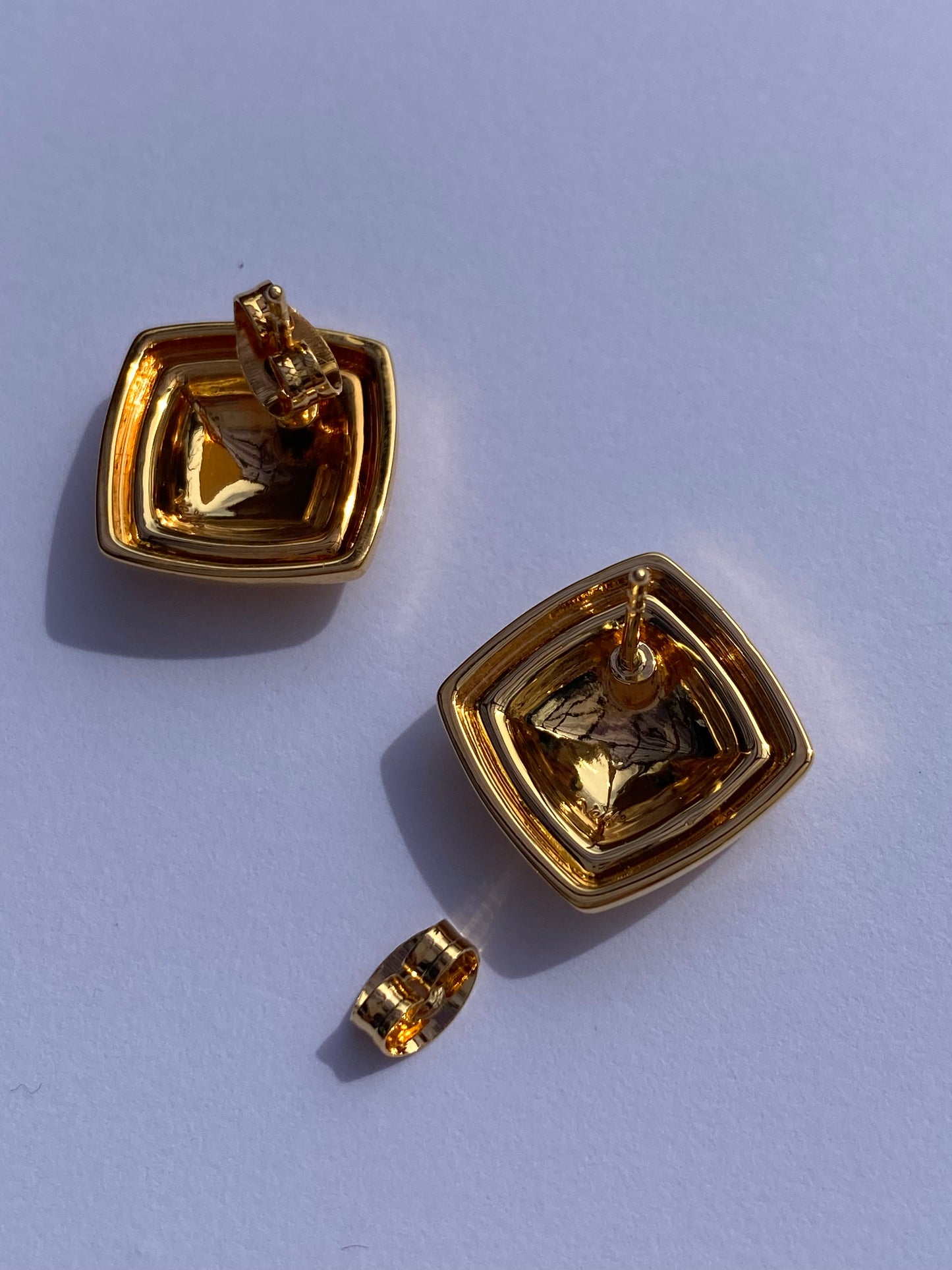 Rosie's bold stud earrings in gold plating